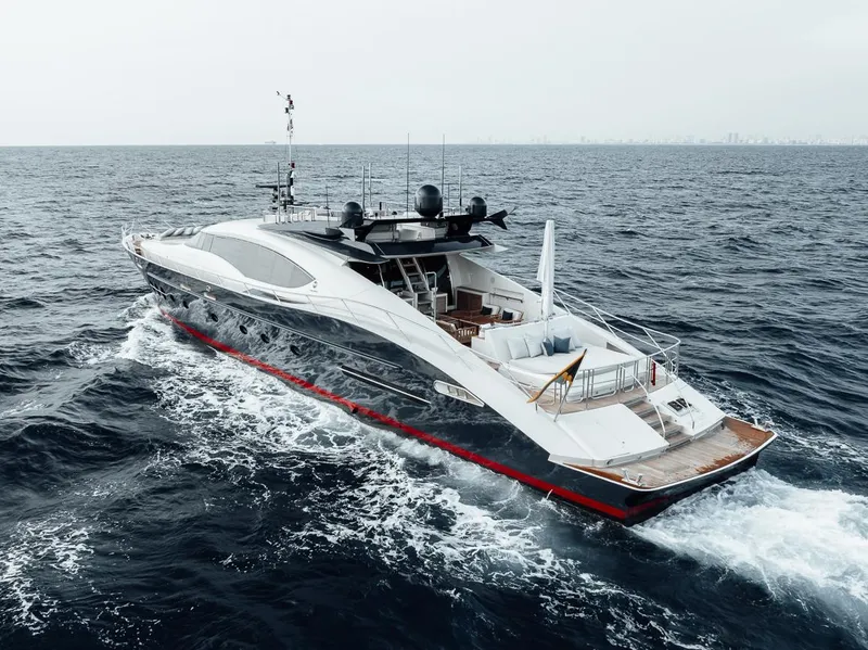 Slide: The Image of Luxury 2006 Palmer Johnson Express yacht cruising on open sea. - 18