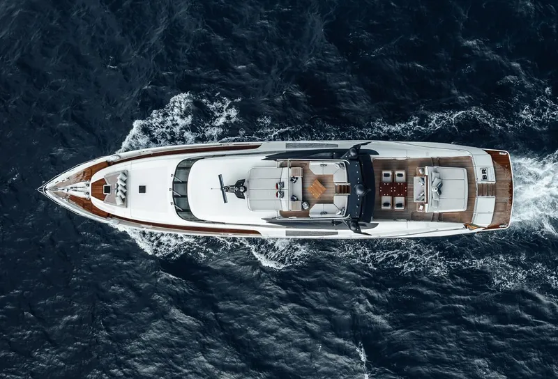 Slide: The Image of Top view of a 2006 Palmer Johnson Express yacht cruising on the ocean. - 20