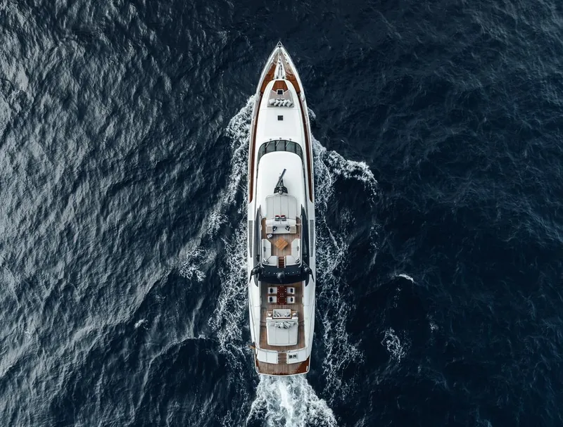 Slide: The Image of Aerial view of 2006 Palmer Johnson Express yacht cruising on open sea. - 21