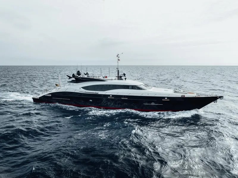 Slide: The Image of 2006 Palmer Johnson Express yacht cruising on open sea. - 22