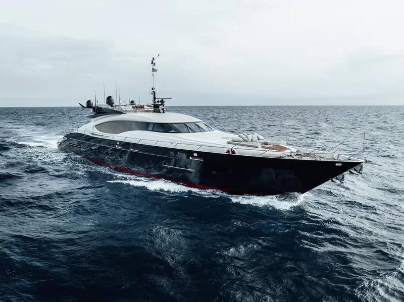 Slide: The Image of Luxury 2006 Palmer Johnson Express yacht cruising on open sea. - 24