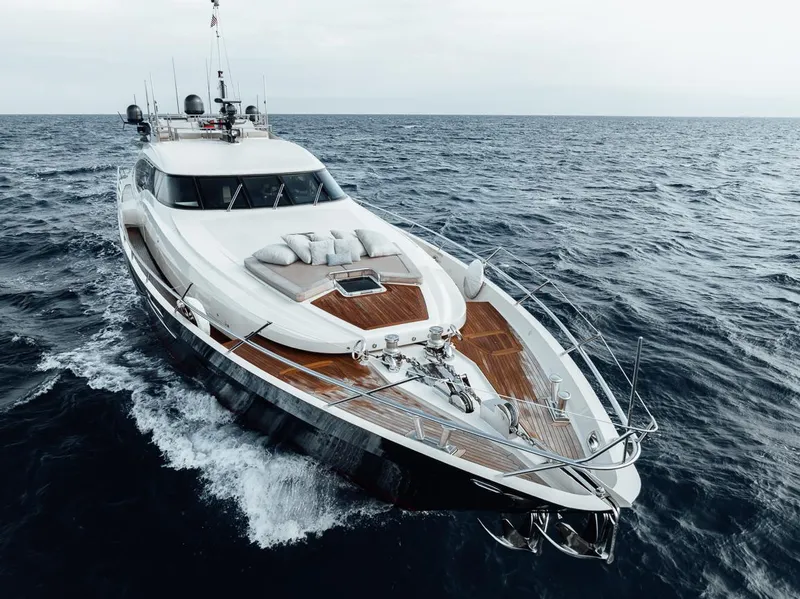 Slide: The Image of Luxury 2006 Palmer Johnson Express yacht cruising on open sea. - 25
