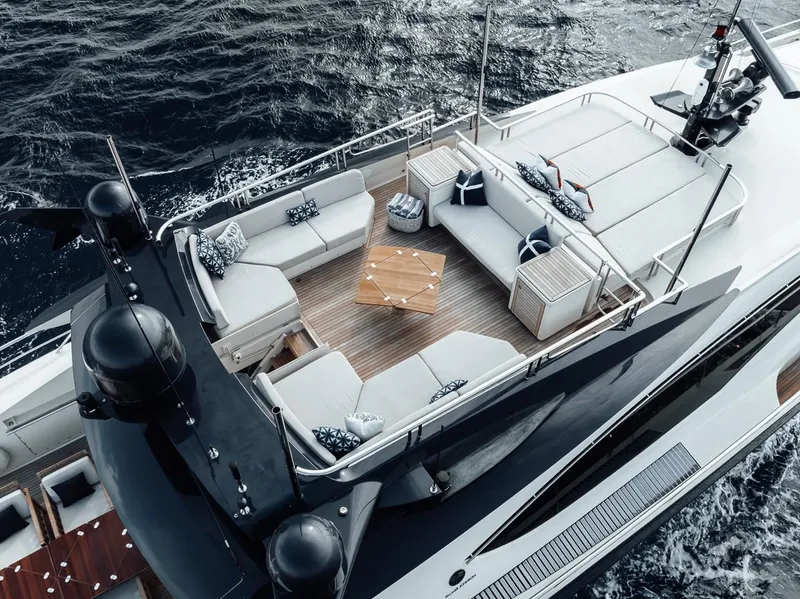 Slide: The Image of Luxurious 2006 Palmer Johnson Express yacht with elegant deck seating and ocean view. - 27