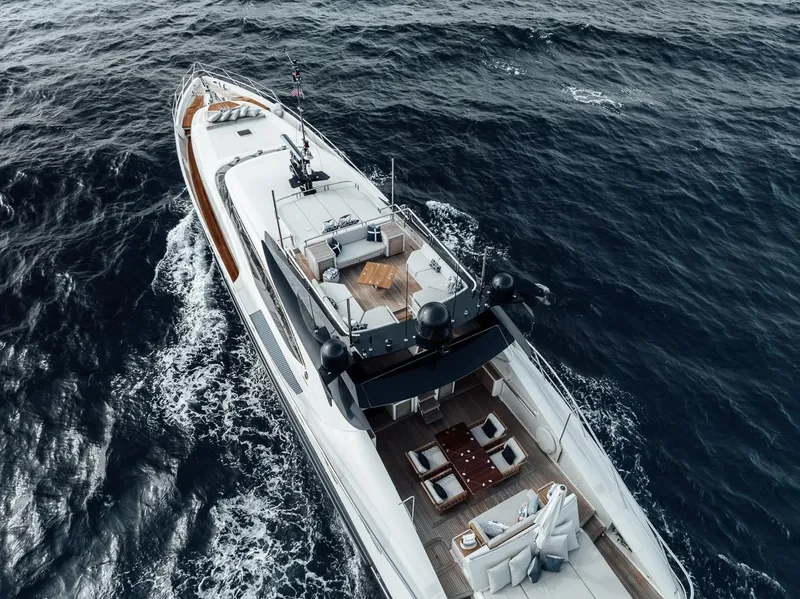 Slide: The Image of 2006 Palmer Johnson Express yacht cruising on open sea, aerial view. - 28
