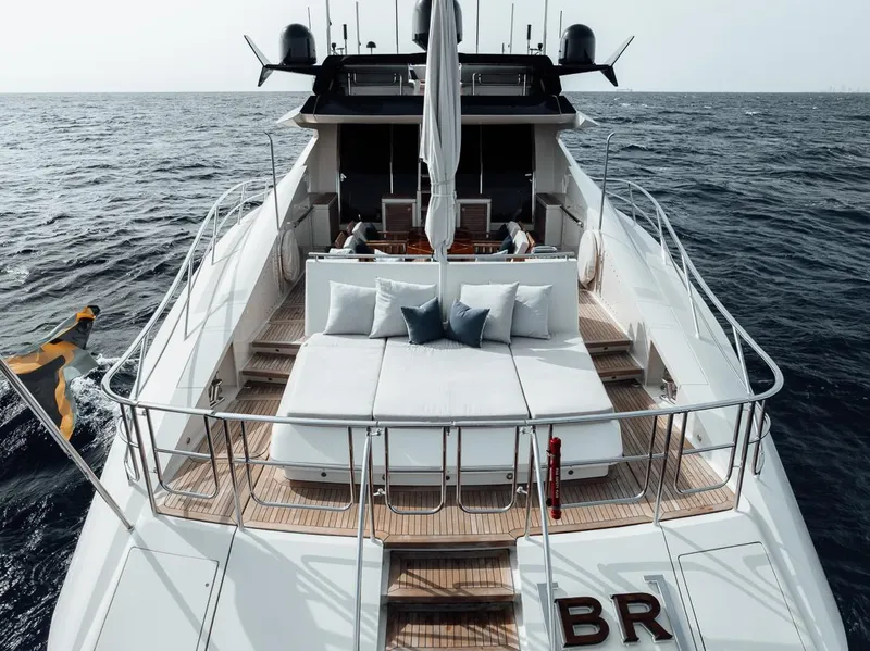 Slide: The Image of Luxurious 2006 Palmer Johnson Express yacht with spacious deck and elegant seating on open sea. - 34