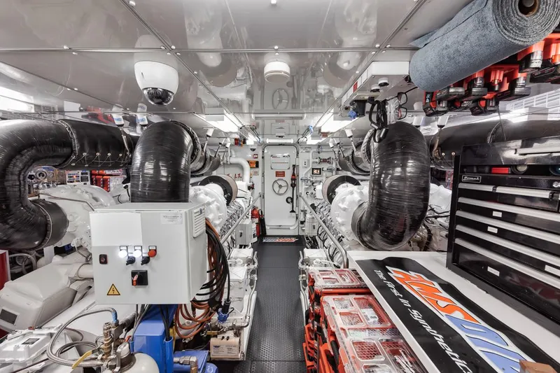 Slide: The Image of Engine room of a 2006 Palmer Johnson Express yacht, featuring advanced machinery and equipment. - 40