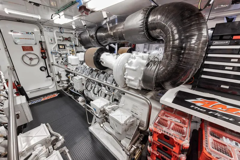 Slide: The Image of Engine room of a 2006 Palmer Johnson Express yacht, featuring advanced machinery and equipment. - 45