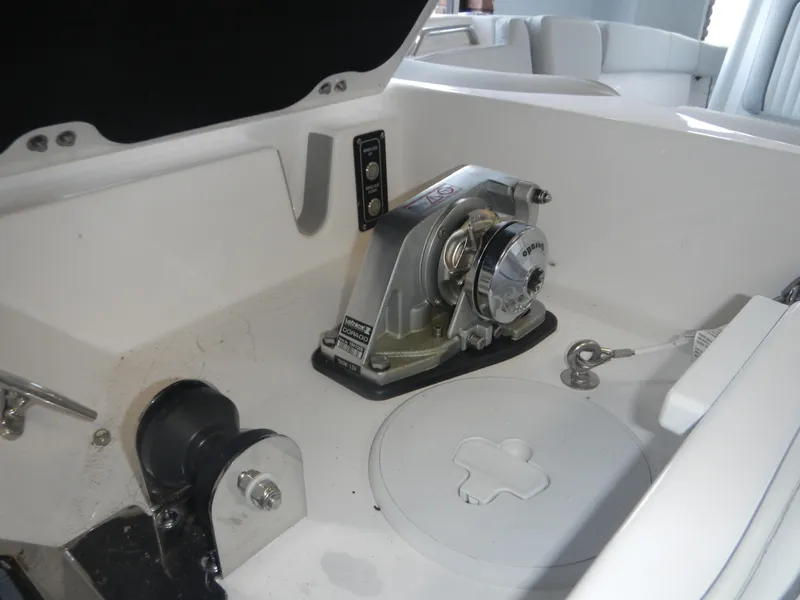Slide: The Image of 2024 Sea Fox 228 Commander boat anchor winch system in white interior. - 19
