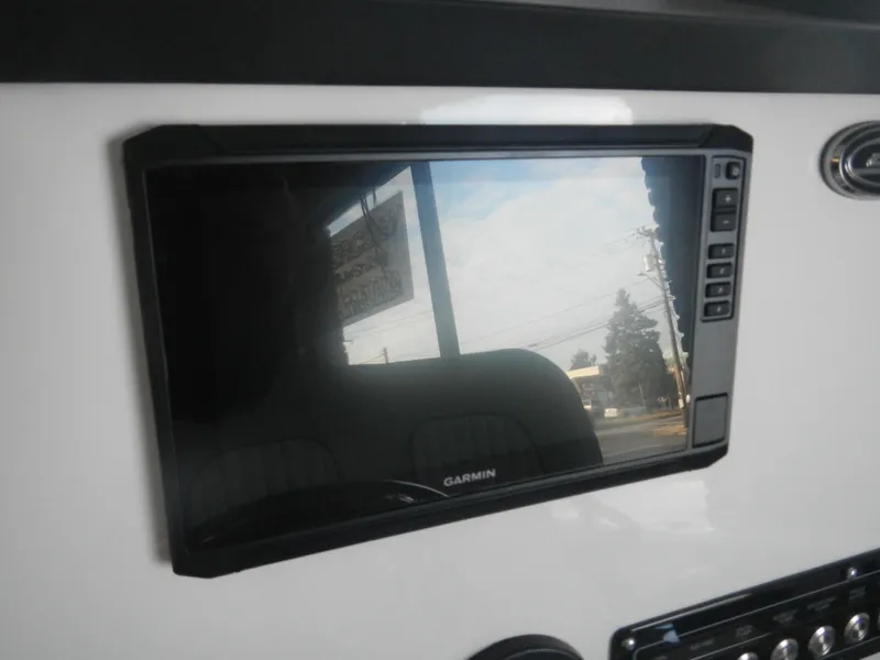 Slide: The Image of Garmin display on 2024 Sea Fox 228 Commander boat dashboard. - 7