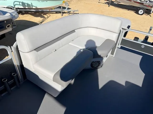 Slide: The Image of 2022 Godfrey Sweetwater 2086 F boat with gray seating on deck. - 7