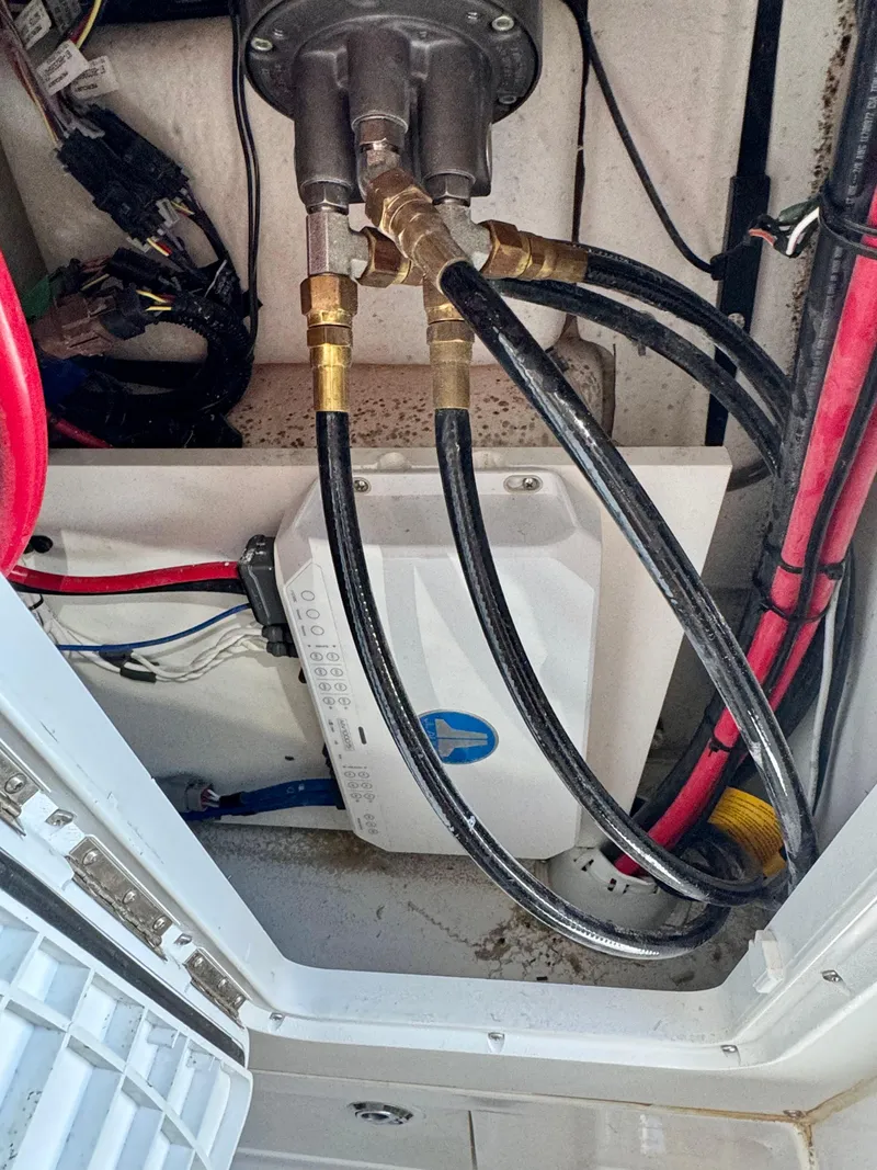 Slide: The Image of Engine compartment of 2024 Blazer 2700 HYBRID BAY with wiring and hoses. - 15