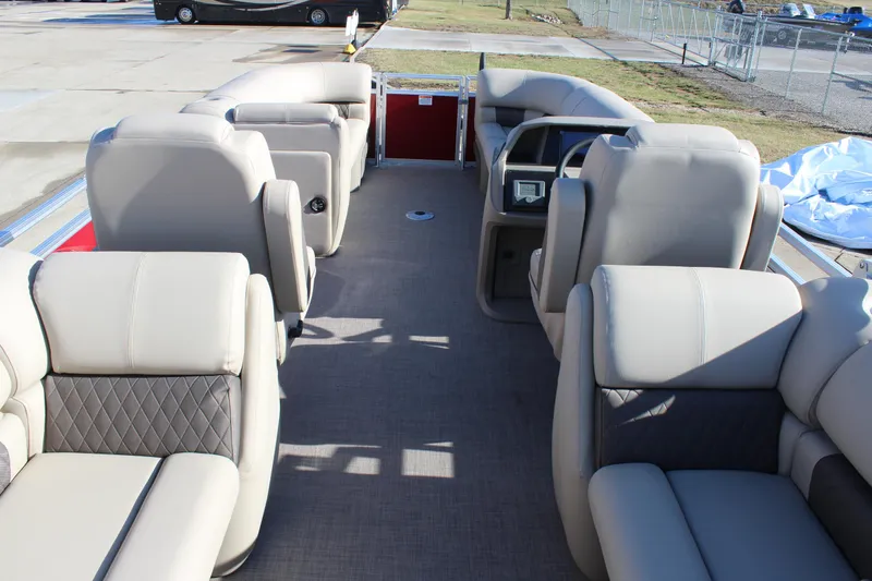 Slide: The Image of 2025 Sun Tracker Party Barge 22 DLX interior with spacious seating and modern design. - 16