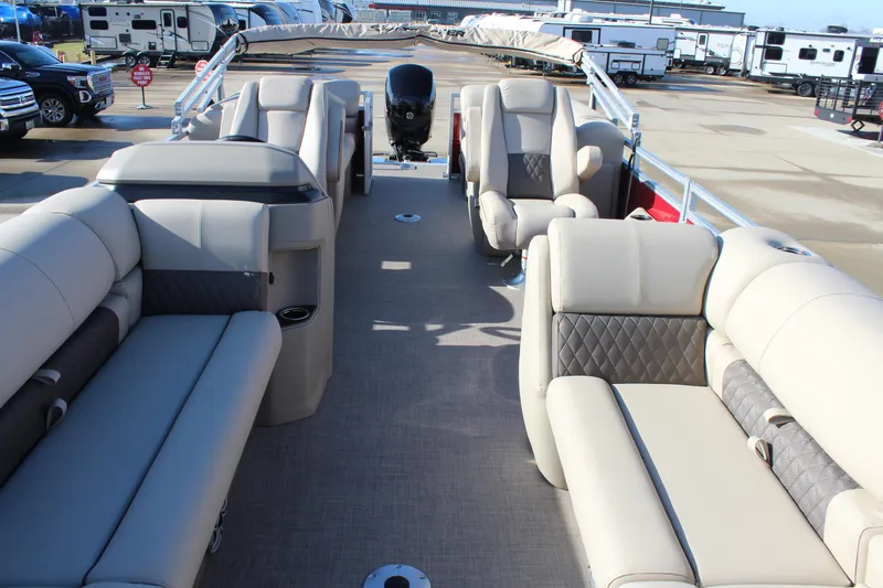 Slide: The Image of 2025 Sun Tracker Party Barge 22 DLX interior with plush seating and spacious layout. - 7