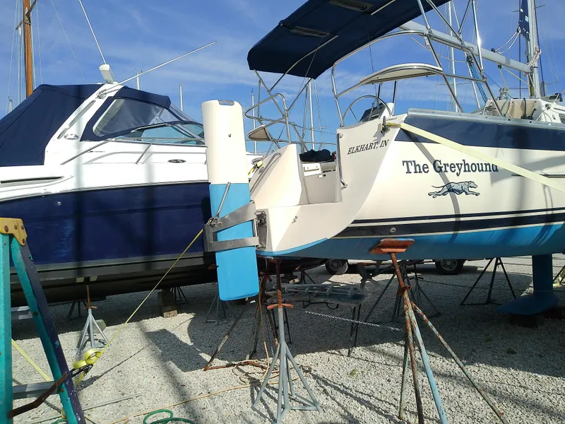 Slide: The Image of 2017 Hake Seaward 32RK sailboat, "The Greyhound," on dry dock with adjacent boat. - 10