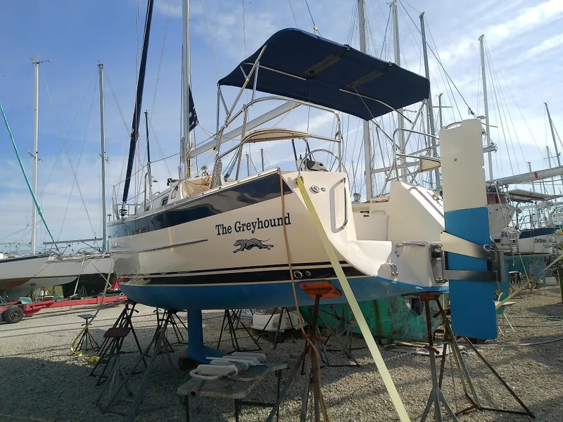 Slide: The Image of 2017 Hake Seaward 32RK sailboat, "The Greyhound," on stands in a boatyard. - 12