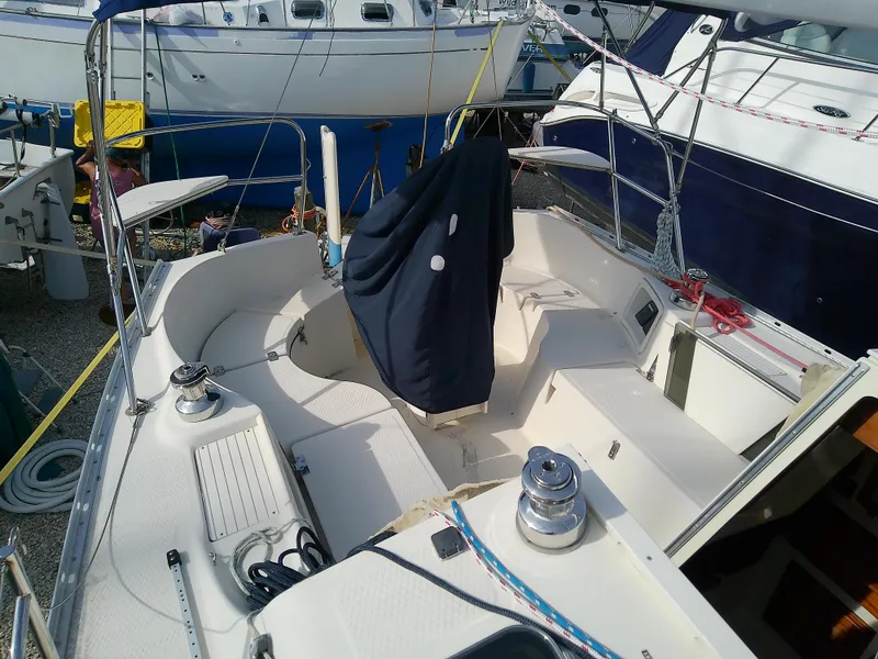 Slide: The Image of 2017 Hake Seaward 32RK sailboat cockpit with covered wheel and winches. - 22