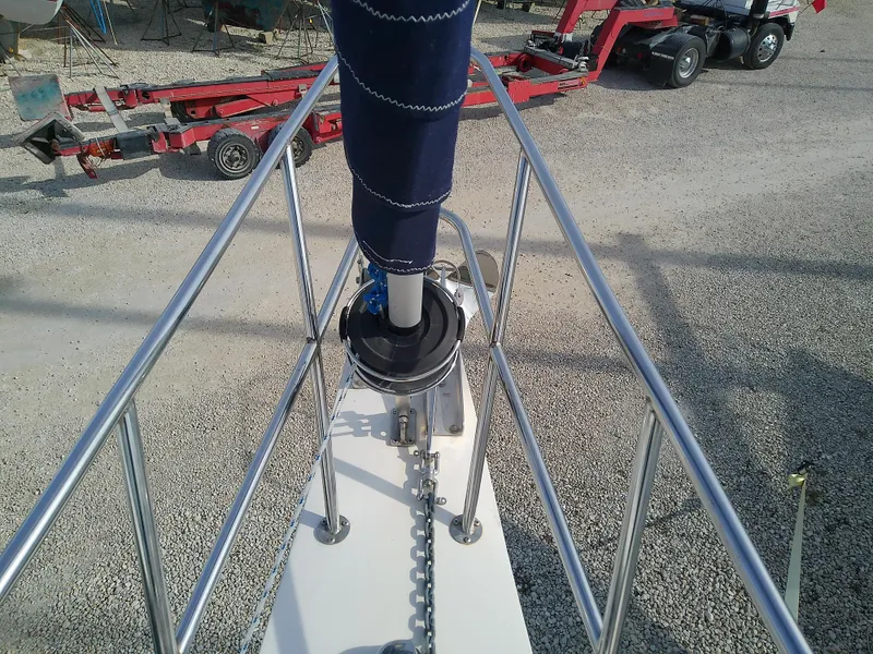 Slide: The Image of Bow view of 2017 Hake Seaward 32RK sailboat with anchor chain and furled sail. - 25