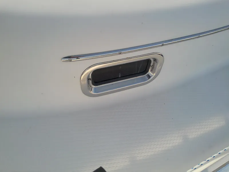 Slide: The Image of Close-up of 2017 Hake Seaward 32RK boat porthole with sleek design. - 32