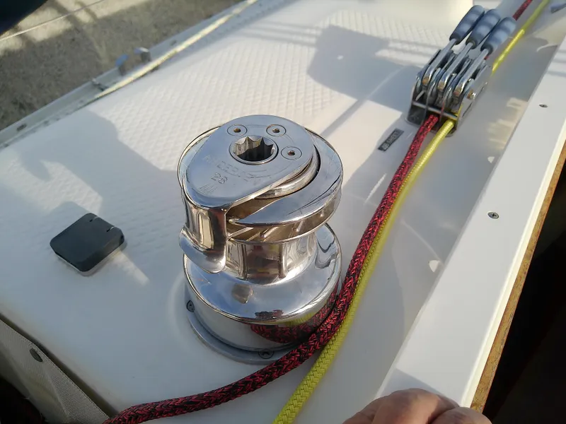 Slide: The Image of Close-up of a 2017 Hake Seaward 32RK sailboat winch and ropes on deck. - 41