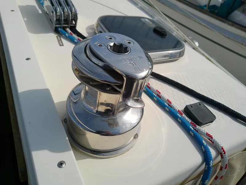 Slide: The Image of Close-up of a 2017 Hake Seaward 32RK sailboat winch and ropes on deck. - 42