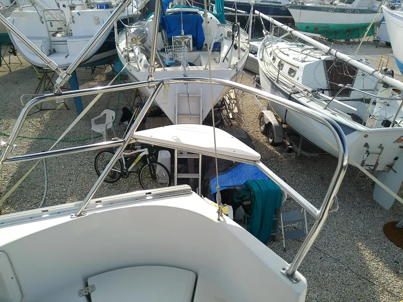 Slide: The Image of 2017 Hake Seaward 32RK sailboat in dry dock, surrounded by other boats. - 45