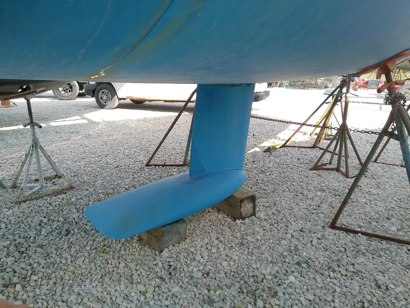 Slide: The Image of 2017 Hake Seaward 32RK sailboat keel on dry dock, supported by stands. - 8