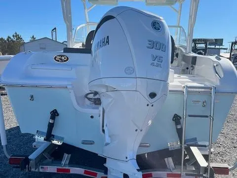 Slide: The Image of 2024 Sea Pro 240DLX boat with Yamaha 300 V6 engine on trailer. - 4