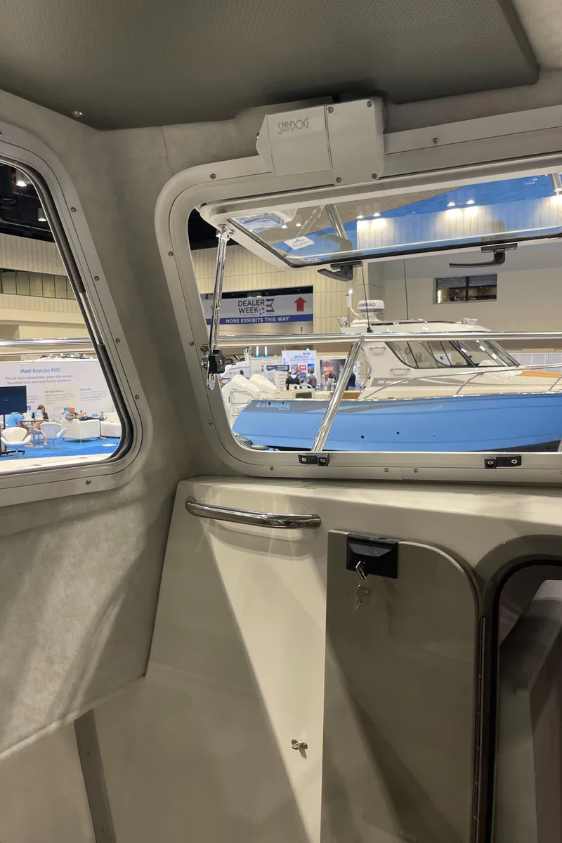 Slide: The Image of Shockwave Sentinel seat mount on 2025 Defiance Admiral 250 EX boat. - 13