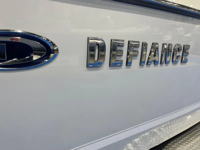 Slide: The Image of 2025 Defiance Admiral 250 EX boat cabin entrance with glass door and windows. - 8