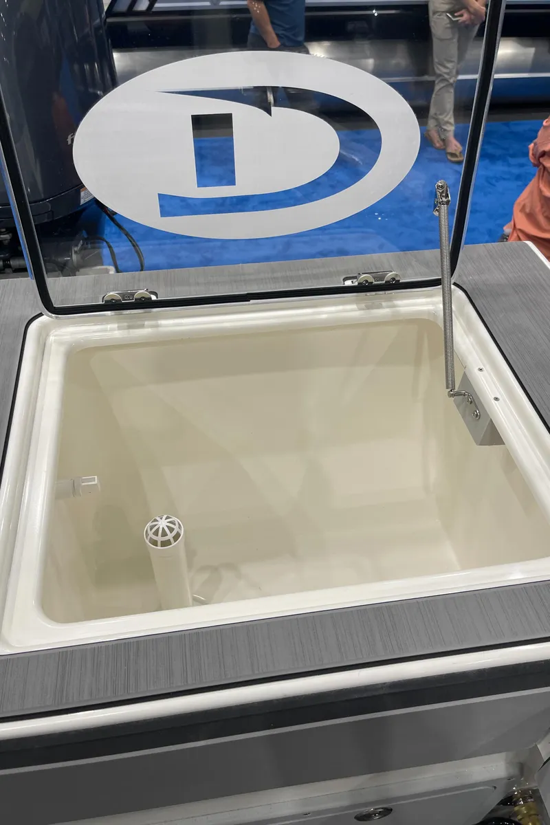 Slide: The Image of 2025 Defiance Admiral 250 EX cabin interior with gray cushioned seating. - 19