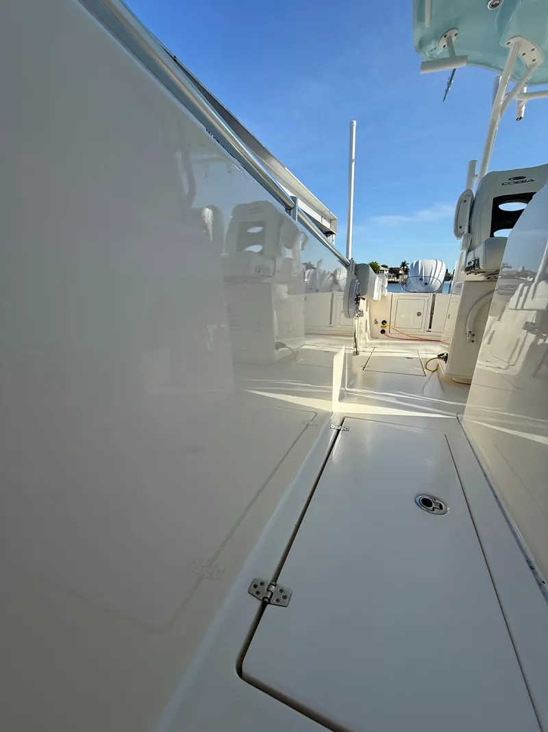 Slide: The Image of 2023 Cobia 350 Center Console boat deck with sleek design and modern features. - 32