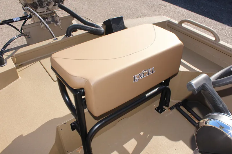 Slide: The Image of 2025 Excel 1860 F4 Shallow Water boat seat and controls, tan upholstery. - 11