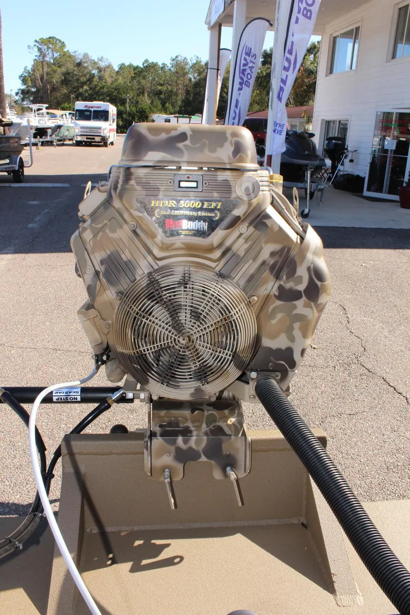 Slide: The Image of 2025 Excel 1860 F4 Shallow Water boat engine with camouflage design. - 25