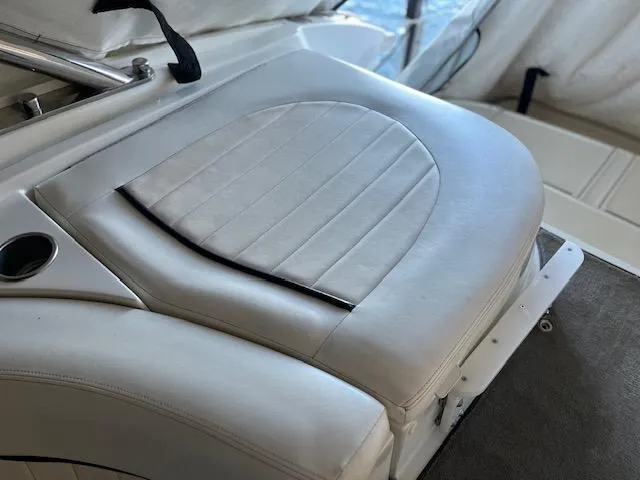 Slide: The Image of Cobalt 282 boat seat, 2005 model, white leather upholstery, close-up view. - 7