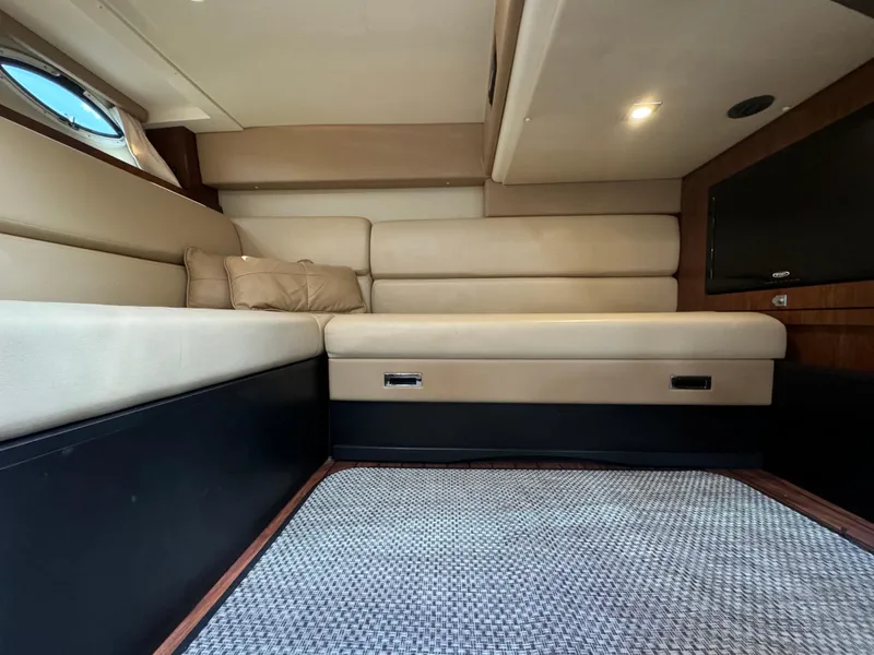 Slide: The Image of Luxurious interior of 2014 Monterey 340 Sport Yacht with beige seating and modern design. - 18