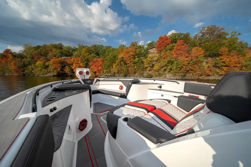 Slide: The Image of 2024 Fountain 43SCX boat interior with autumn foliage background. - 10