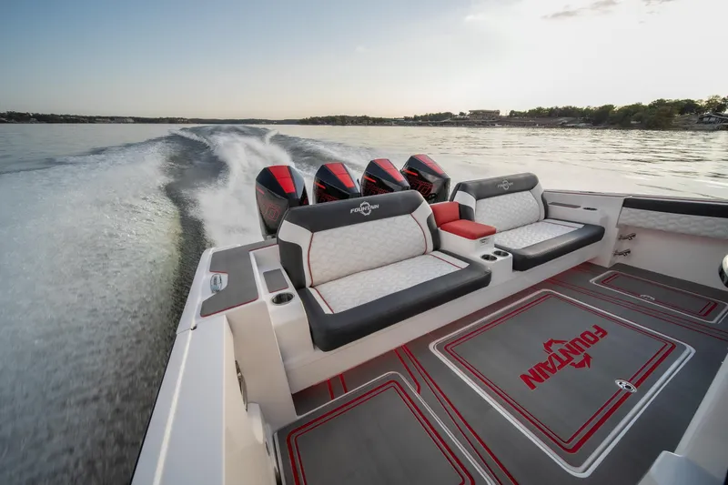 Slide: The Image of 2024 Fountain 43SCX boat with powerful engines cruising on open water. - 12