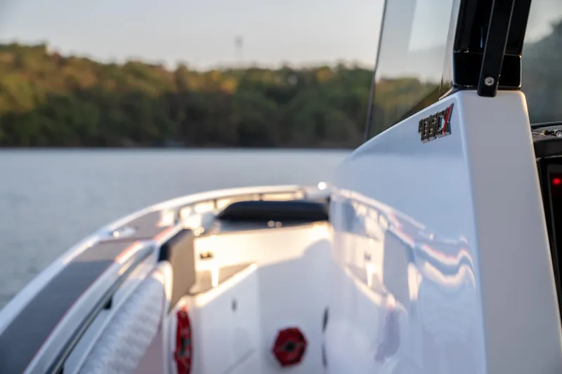 Slide: The Image of 2024 Fountain 43SCX boat on calm water, showcasing sleek design and modern features. - 20