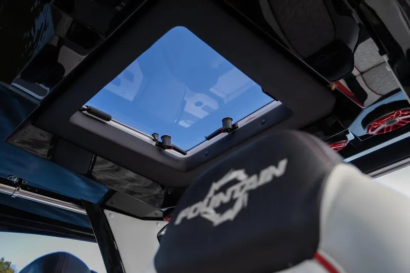 Slide: The Image of 2024 Fountain 43SCX boat interior with sunroof and branded seat. - 34