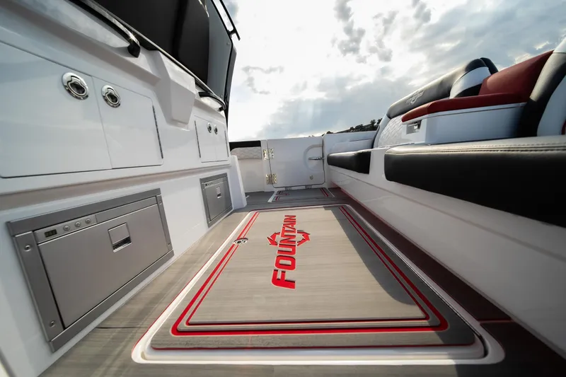 Slide: The Image of 2024 Fountain 43SCX boat interior with sleek seating and branded flooring. - 39