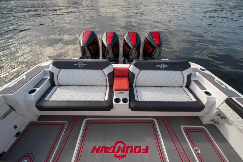 Slide: The Image of 2024 Fountain 43SCX boat with quad engines and stylish seating on water. - 44