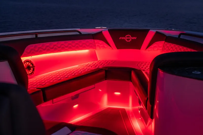 Slide: The Image of 2024 Fountain 43SCX boat interior with vibrant red LED lighting. - 64
