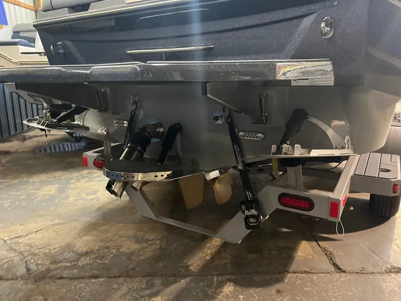 Slide: The Image of 2024 Supreme S220 boat trailer with advanced towing features in a garage setting. - 10