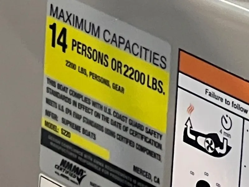 Slide: The Image of Maximum capacity label for 2024 Supreme S220 boat: 14 persons or 2200 lbs. - 20