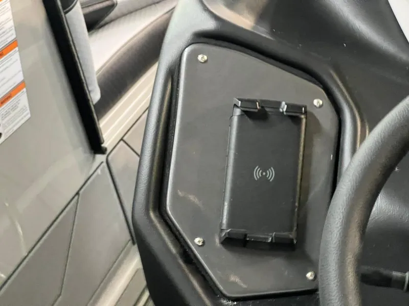 Slide: The Image of 2024 Supreme S220 dashboard with wireless charging pad. - 21