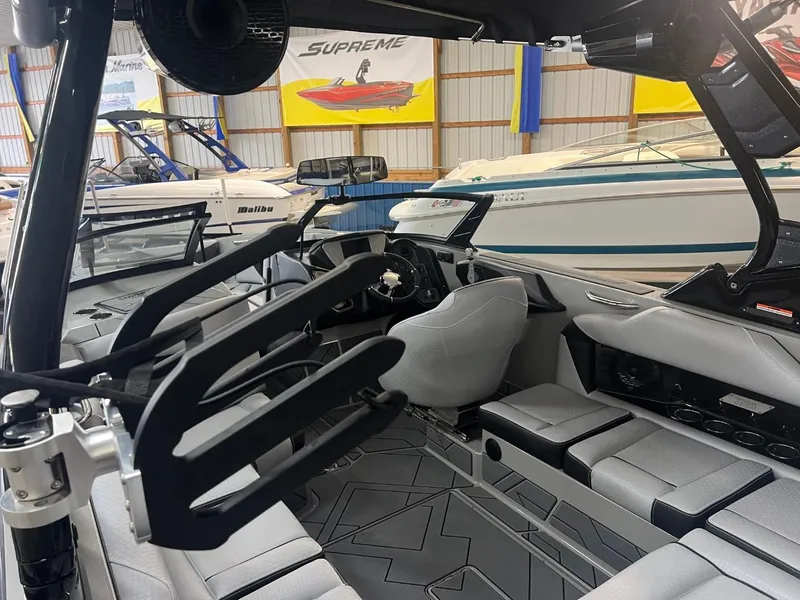 Slide: The Image of 2024 Supreme S220 boat interior with modern seating and sleek design. - 36