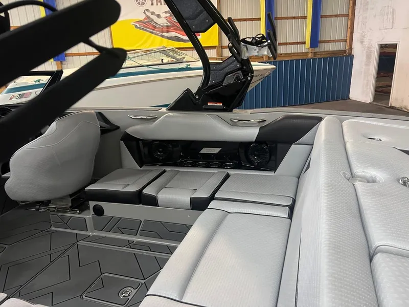 Slide: The Image of 2024 Supreme S220 boat interior with modern seating and sleek design. - 37