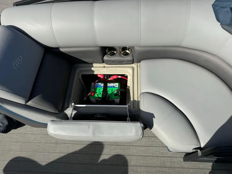 Slide: The Image of 2022 Manitou 23' Oasis RFSHP373 boat seat with open storage compartment. - 15