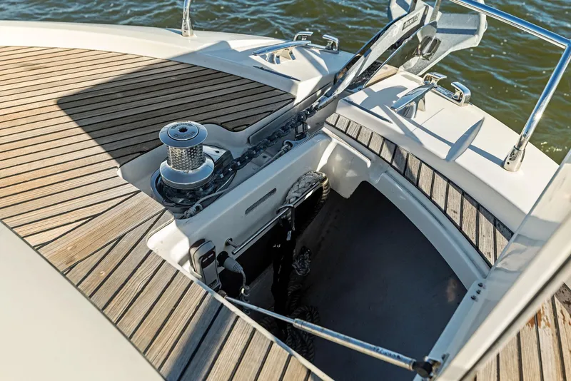 Slide: The Image of Prestige 520 Fly 2019 yacht anchor compartment with teak decking. - 22