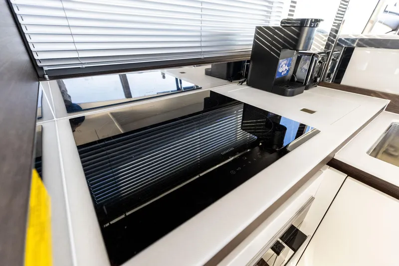 Slide: The Image of Modern kitchen on 2019 Prestige 520 Fly yacht with sleek appliances. - 47